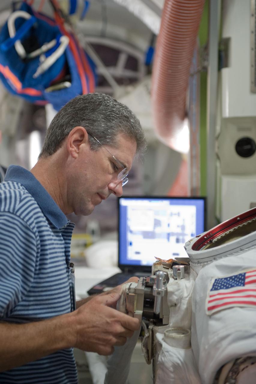 JSC2009-E-214808 (29 Sept. 2009) --- Astronaut Mike Good, STS-132 mission specialist, participates in a training session in an International Space Station mock-up/trainer in the Space Vehicle Mock-up Facility at NASA's Johnson Space Center.