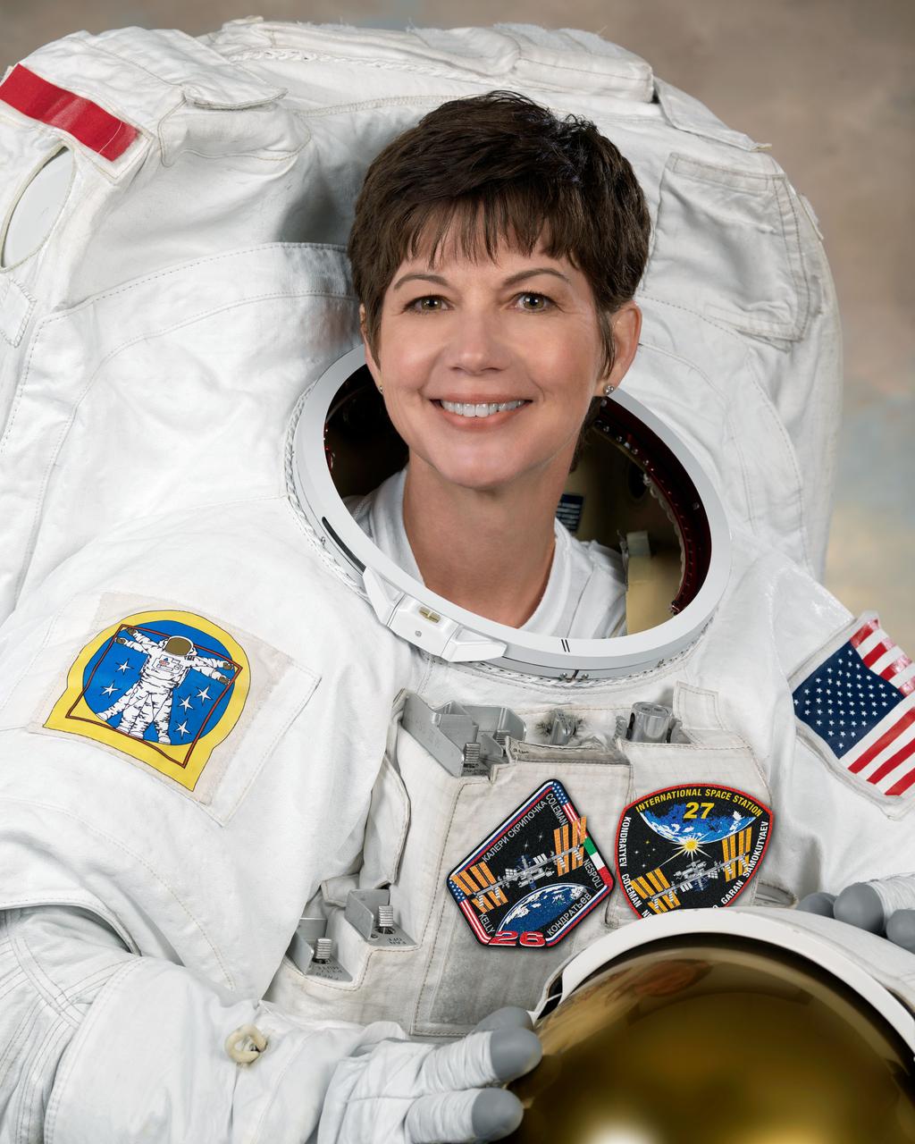 Photo Date: July 29, 2009 / Location: Building 8 Room 272 - Photo Studio / Subject: Catherine Coleman Official Individual EMU Astronaut Portrait / Photographer: Robert Markowitz