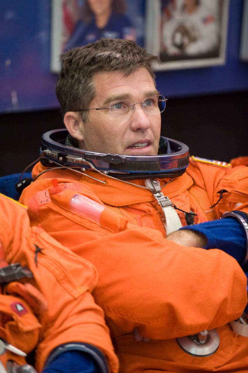 JSC2009-E-224128 (20 Oct. 2009) --- Astronaut Steve Bowen, STS-132 mission specialist, attired in a training version of his shuttle launch and entry suit, awaits the start of a training session in the Space Vehicle Mock-up Facility at NASA?s Johnson Space Center.