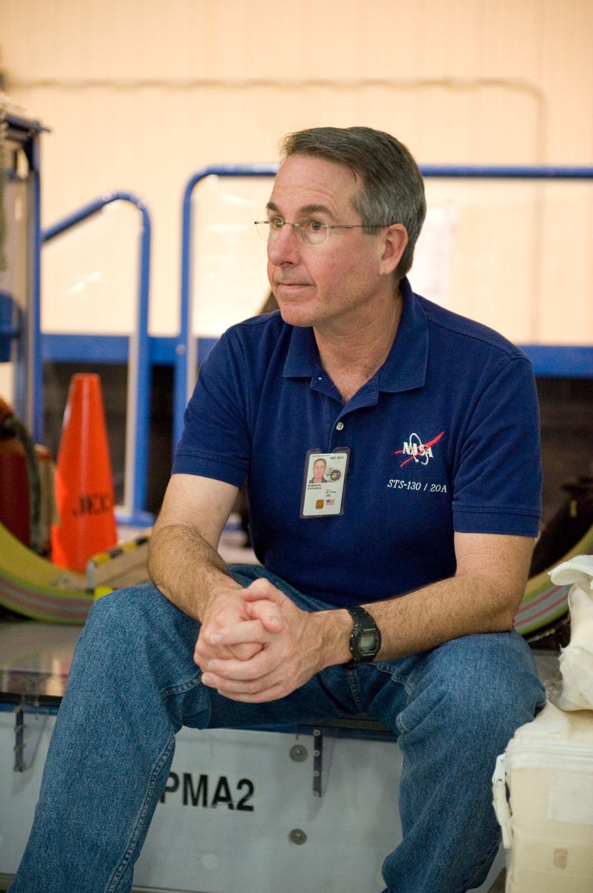 JSC2009-E-224179 (7 Oct. 2009) --- Astronaut Stephen Robinson, STS-130 mission specialist, is pictured during a training session in an International Space Station mock-up/trainer in the Space Vehicle Mock-up Facility at NASA's Johnson Space Center.