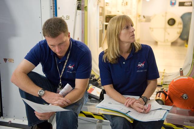 NASA image: STS-130 crew and Expedition 22 crew member T.J. Creamer during module outfitting training. 