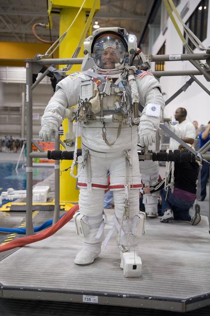 NASA image: Expedition 24 crew members Tracy Caldwell and Doug Wheelock during ISS EVA 1 91027 training 