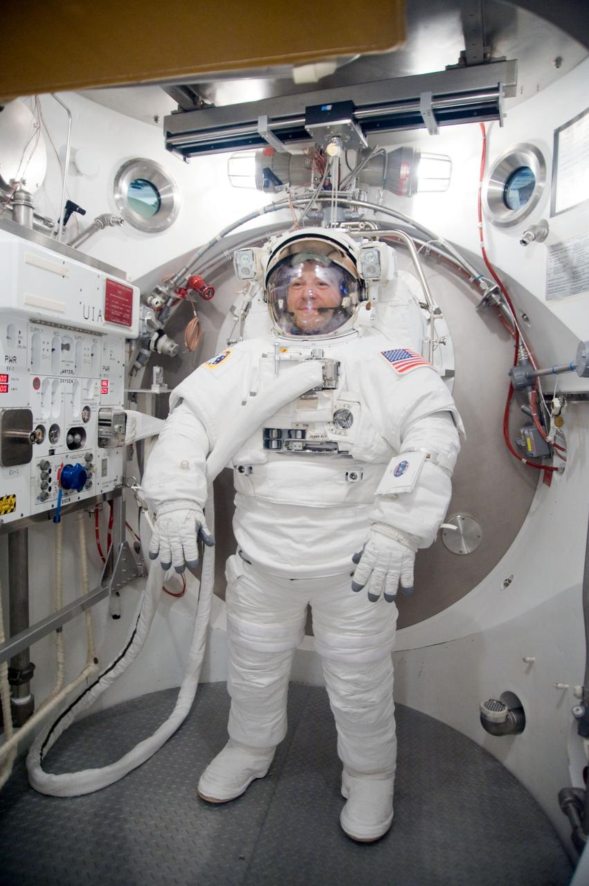 JSC2009-E-228764 (29 Oct. 2009) --- Astronaut Nicholas Patrick, STS-130 mission specialist, participates in an Extravehicular Mobility Unit (EMU) spacesuit fit check in the Space Station Airlock Test Article (SSATA) in the Crew Systems Laboratory at NASA's Johnson Space Center.