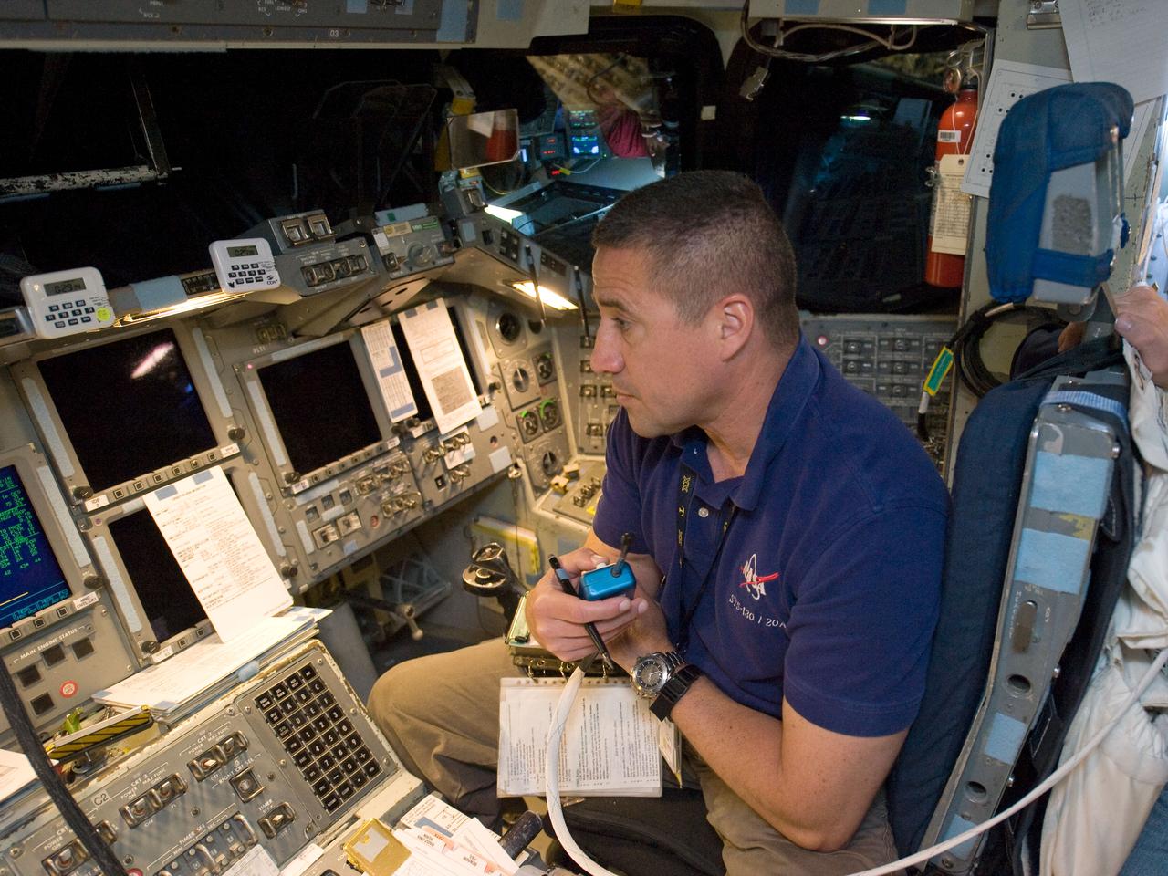 JSC2009-E-240770 (12 Nov. 2009) --- Astronaut George Zamka, STS-130 commander, occupies the pilot?s station during a training session in the fixed-base shuttle mission simulator (SMS) in the Jake Garn Simulation and Training Facility at Johnson Space Center.