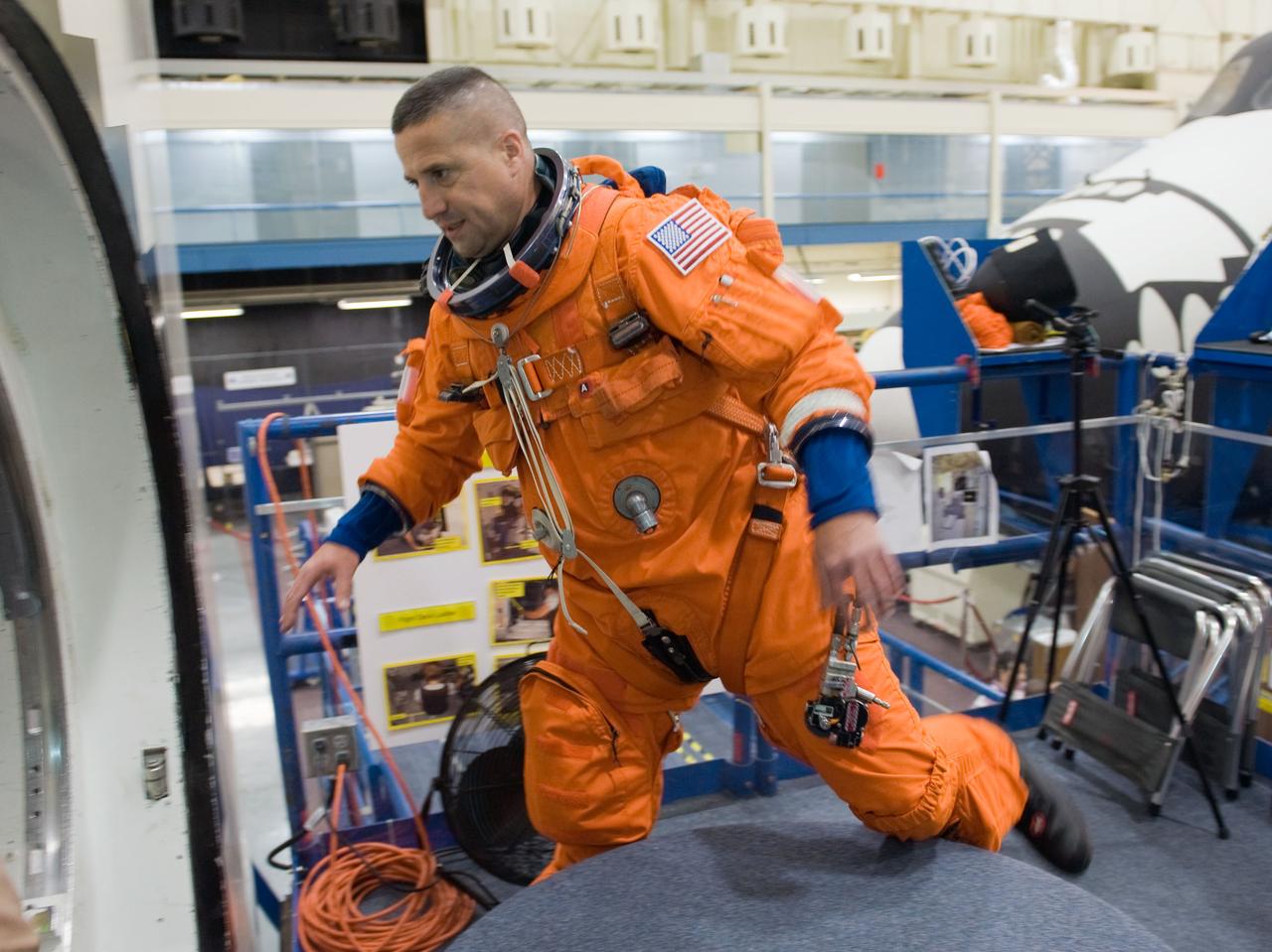 JSC2009-E-242835 (19 Nov. 2009) --- Astronaut George Zamka, STS-130 commander, attired in a training version of his shuttle launch and entry suit, participates in a training session in the Space Vehicle Mockup Facility at NASA's Johnson Space Center.
