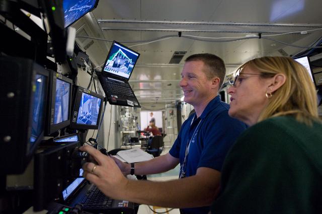 NASA image: STS-130 crew members Kay Hire and Terry Virts training in the ISS Lab 