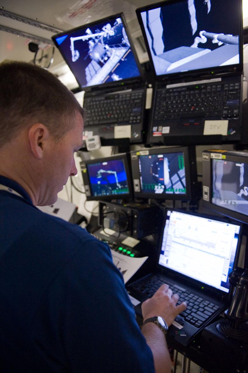 JSC2009-E-246745 (4 Dec. 2009) --- Astronaut Terry Virts, STS-130 pilot, participates in a robotics training session in the Jake Garn Simulation and Training Facility at NASA's Johnson Space Center.