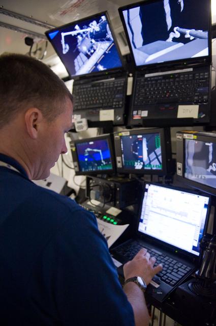 NASA image: STS-130 crew members Kay Hire and Terry Virts training in the ISS Lab 