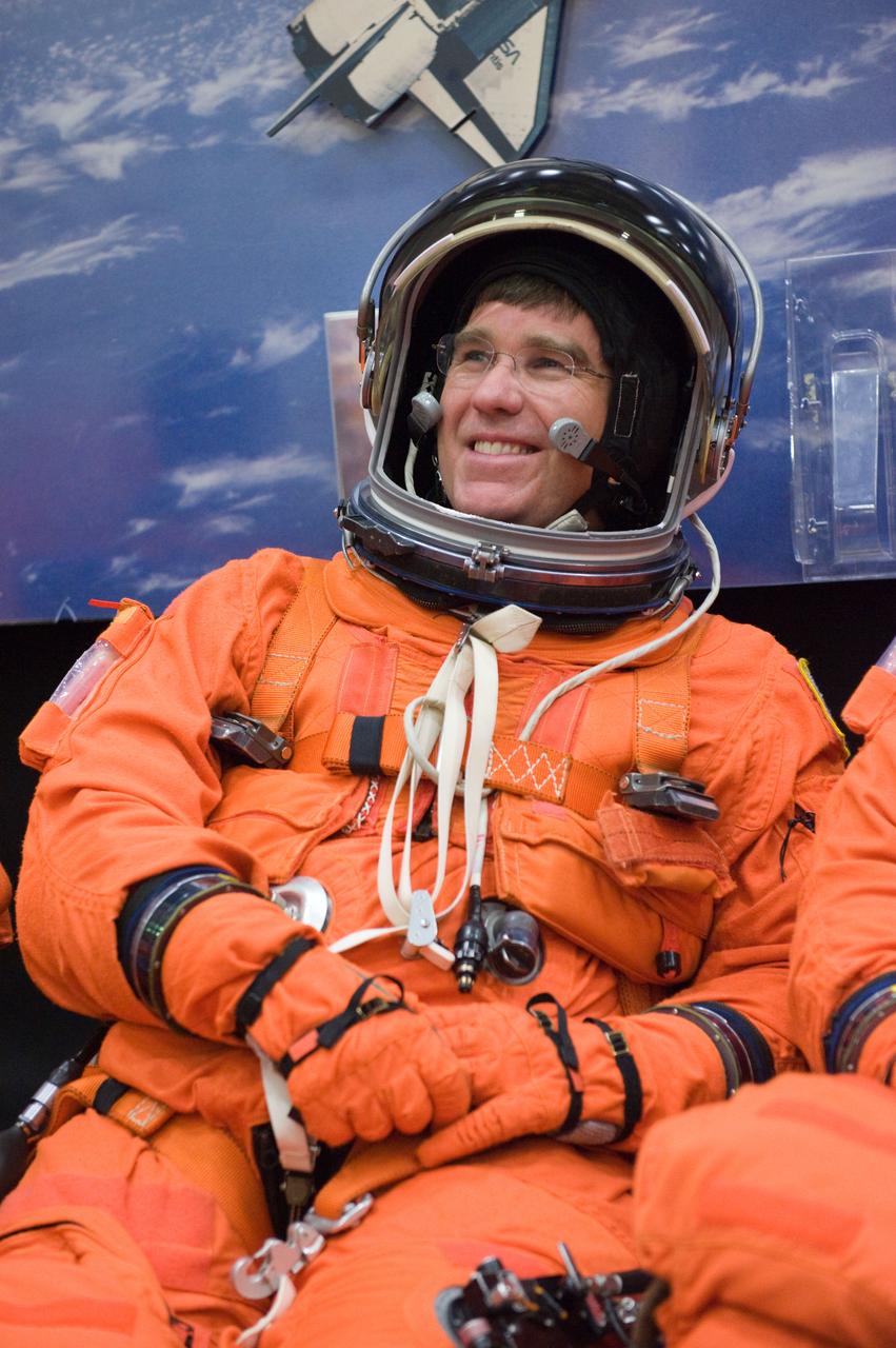 JSC2009-E-258472 (8 Dec. 2009) --- Attired in a training version of his shuttle launch and entry suit, astronaut Steve Bowen, STS-132 mission specialist, awaits the start of a training session in the Space Vehicle Mock-up Facility at NASA's Johnson Space Center.