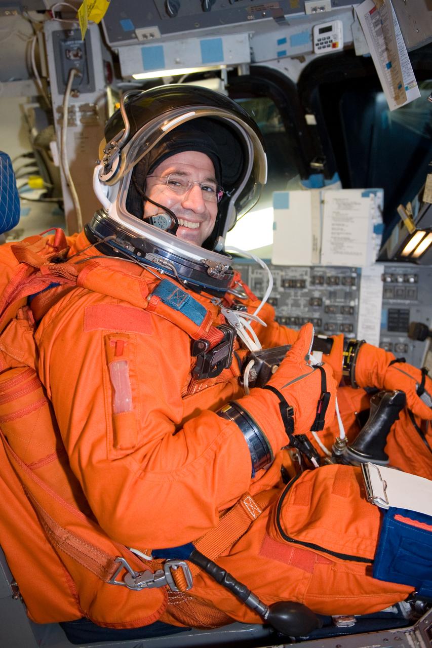 JSC2009-E-286660 (21 Dec. 2009) --- Astronaut George Zamka, STS-130 commander, attired in a training version of his shuttle launch and entry suit, occupies the commander?s station during a training session in the Mission Simulation Development Facility at NASA's Johnson Space Center.