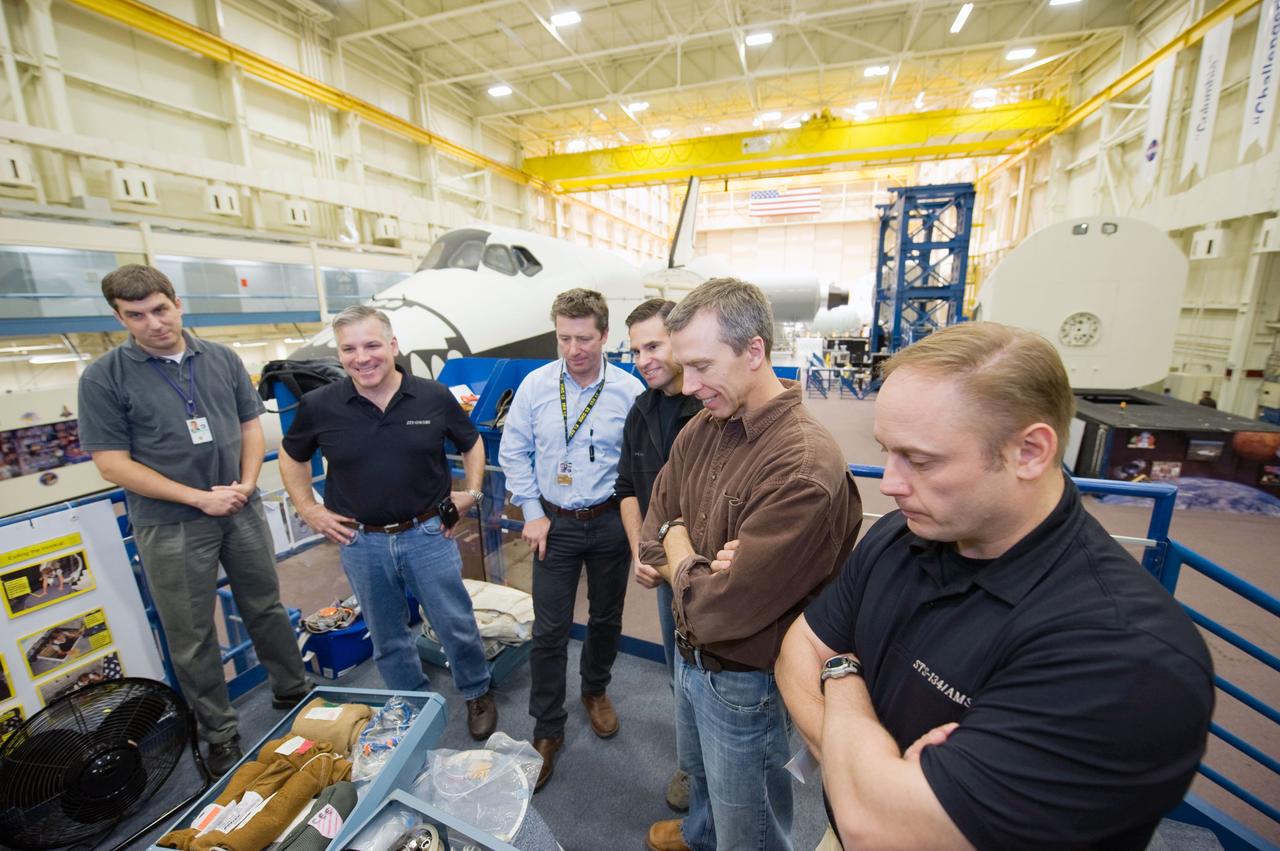 JSC2010-E-009602 (13 Jan. 2010) --- STS-134 crew members participate in a training session in the Space Vehicle Mock-up Facility at NASA?s Johnson Space Center. Pictured from the second left are NASA astronaut Gregory H. Johnson, pilot; European Space Agency astronaut Roberto Vittori, NASA astronauts Greg Chamitoff, Andrew Feustel and Michael Fincke, all mission specialists.