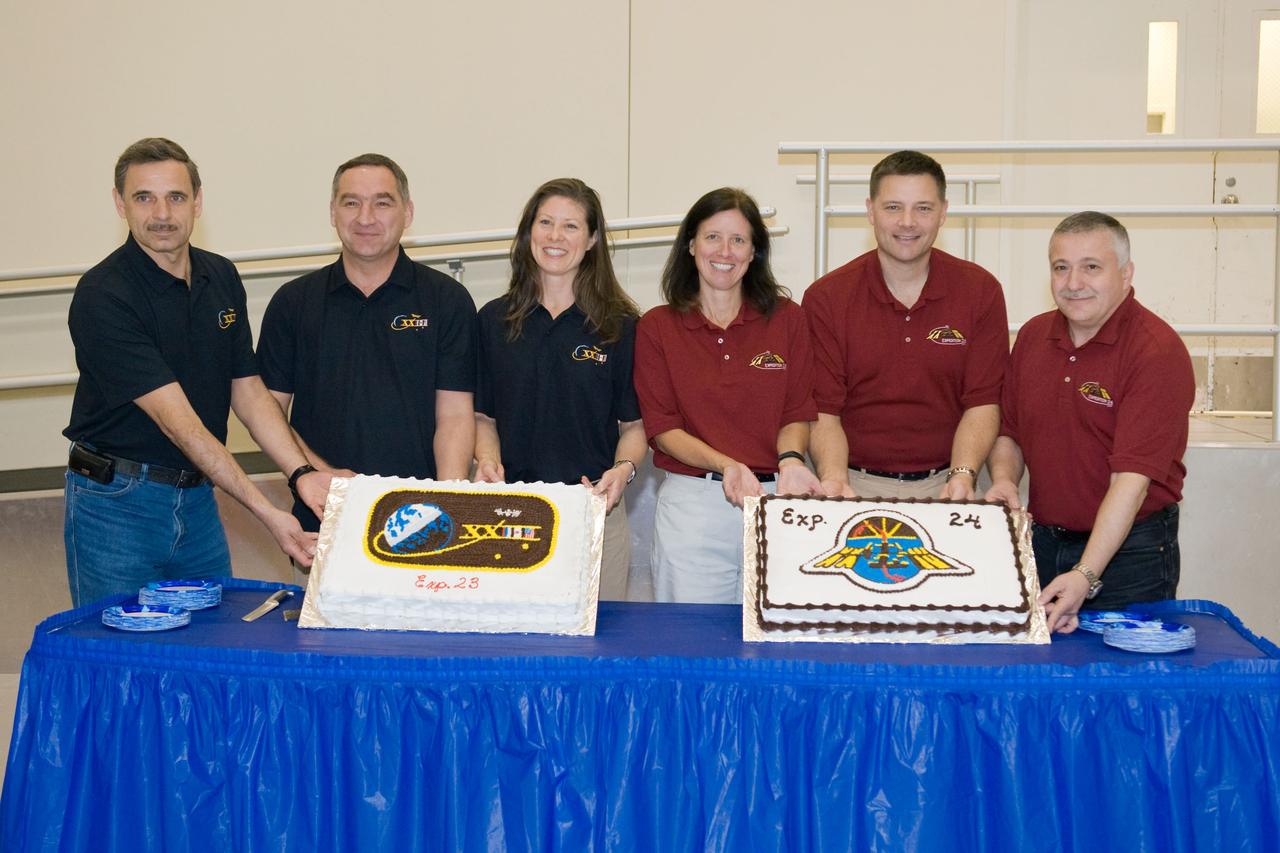 Date: 1-21-10 Location: Bldg 5 - High Bay Subject: Expedition 23/24 cake cutting ceremony celebrating the conclusion of their training. Photographer: Lauren Harnett