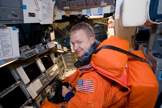 NASA image: STS-133 crew members Lindsey, Boe, Drew and Kopra for Motion Base Ascent Skill 32011 training