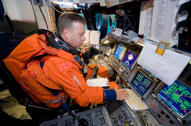 NASA image: STS-133 crew members Lindsey, Boe, Drew and Kopra for Motion Base Ascent Skill 32011 training 