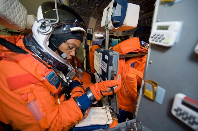 NASA image: STS-133 crew members Lindsey, Boe, Drew and Kopra for Motion Base Ascent Skill 32011 training 