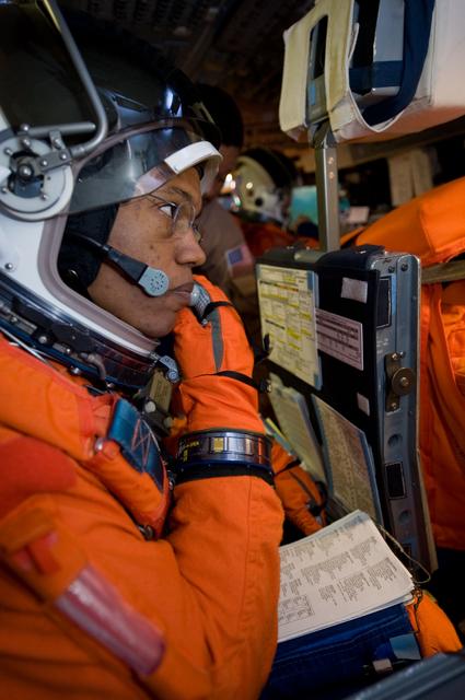 NASA image: STS-133 crew members Lindsey, Boe, Drew and Kopra for Motion Base Ascent Skill 32011 training 