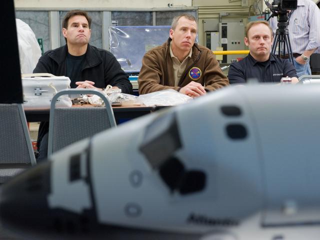 NASA image: STS-134 crew members Mike Fincke, Drew Feustel and Greg Chamitoff performing EVA Tile Repair Training. 