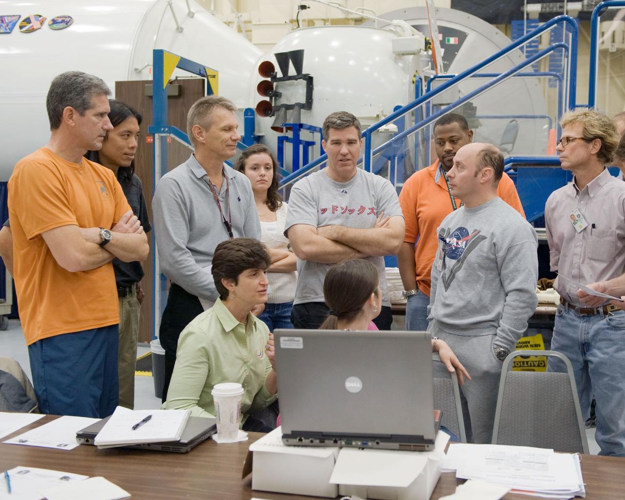 JSC2010-E-015330 (27 Jan. 2010) --- STS-132 crew members participate in a training session in the Space Vehicle Mock-up Facility at NASA's Johnson Space Center. Pictured (standing) from the left foreground are NASA astronauts Michael Good, Piers Sellers, Steve Bowen and Garrett Reisman, all mission specialists. Also pictured are several instructors.