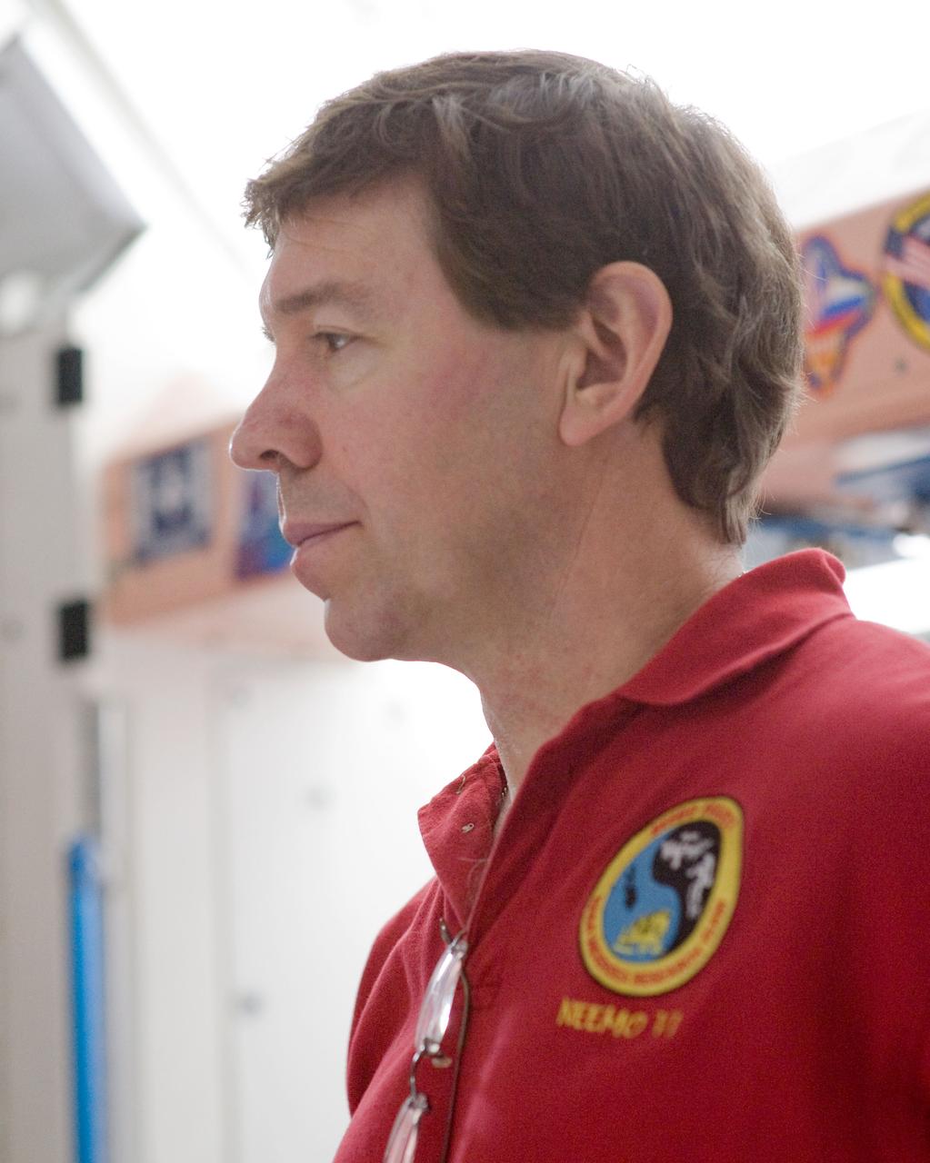 JSC2010-E-017949 (2 Feb. 2010) --- NASA astronaut Michael Barratt, STS-133 mission specialist, is pictured during a training session in an International Space Station mock-up/trainer in the Space Vehicle Mock-up Facility at NASA's Johnson Space Center.