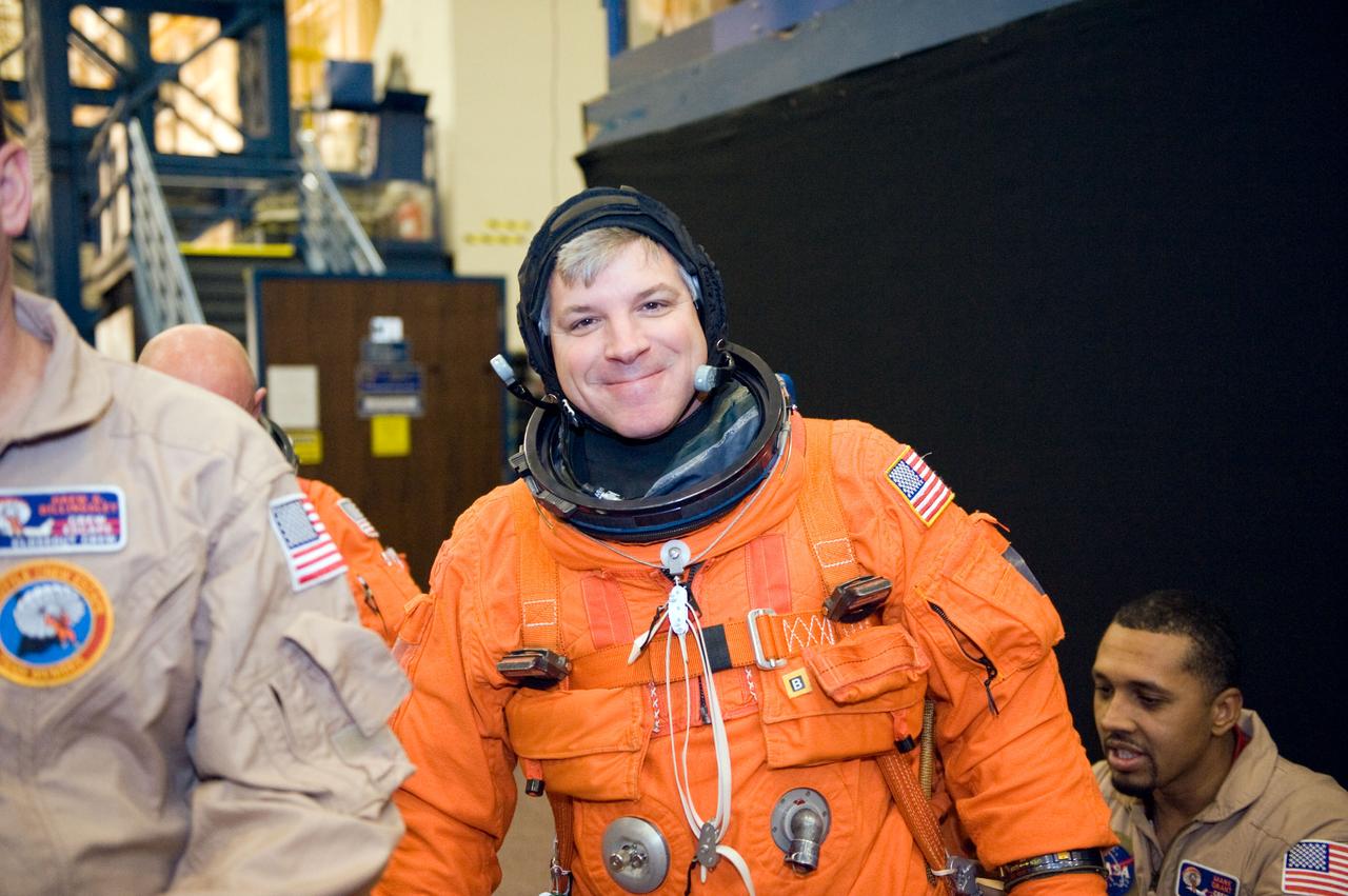 JSC2010-E-018507 (3 Feb. 2010) --- NASA astronaut Gregory H. Johnson, STS-134 pilot, attired in a training version of his shuttle launch and entry suit, is pictured prior to the start of a training session in the Space Vehicle Mock-up Facility at NASA's Johnson Space Center.