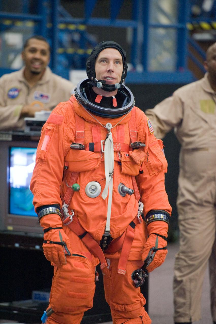 JSC2010-E-018532 (3 Feb. 2010) --- NASA astronaut Andrew Feustel, STS-134 mission specialist, attired in a training version of his shuttle launch and entry suit, is pictured during a training session in the Space Vehicle Mock-up Facility at NASA's Johnson Space Center.