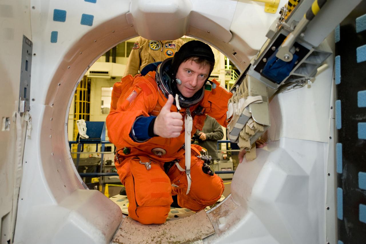 JSC2010-E-018893 (3 Feb. 2010) --- European Space Agency astronaut Roberto Vittori, STS-134 mission specialist, attired in a training version of his shuttle launch and entry suit, participates in a training session in the Space Vehicle Mock-up Facility at NASA's Johnson Space Center.