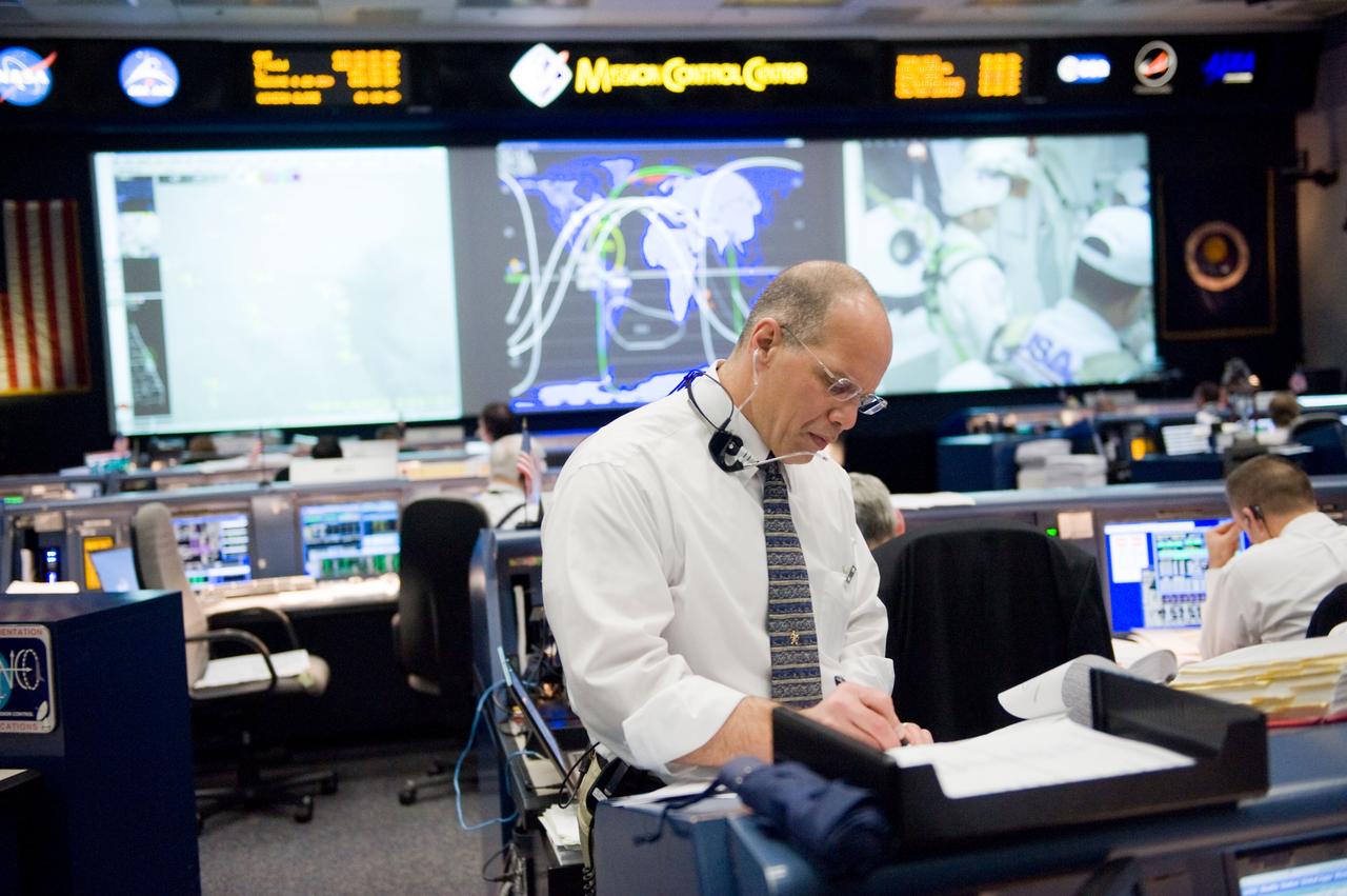 JSC2010-E-018927 (7 Feb. 2010) --- Flight director Tony Ceccacci is pictured in the space shuttle flight control room in the Johnson Space Center's Mission Control Center during the first launch attempt of the STS-130 mission. The launch was postponed until Feb. 8, due to weather conditions.