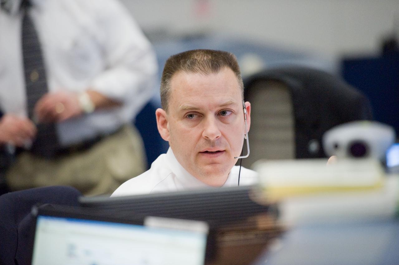 JSC2010-E-018932 (7 Feb. 2010) --- Flight director Norm Knight is pictured at his console in the space shuttle flight control room in the Johnson Space Center's Mission Control Center during the first launch attempt of the STS-130 mission. The launch was postponed until Feb. 8, due to weather conditions.