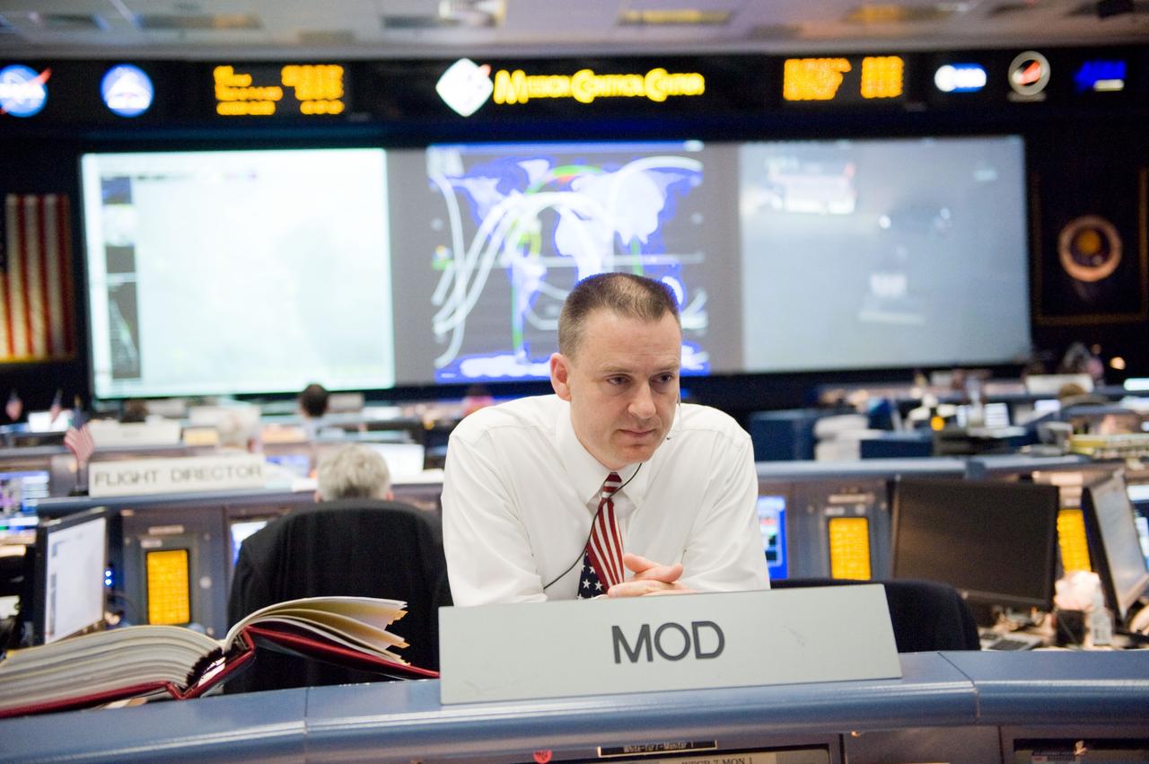 JSC2010-E-018947 (7 Feb. 2010) --- Flight director Norm Knight is pictured in the space shuttle flight control room in the Johnson Space Center's Mission Control Center during the first launch attempt of the STS-130 mission. The launch was postponed until Feb. 8, due to weather conditions.