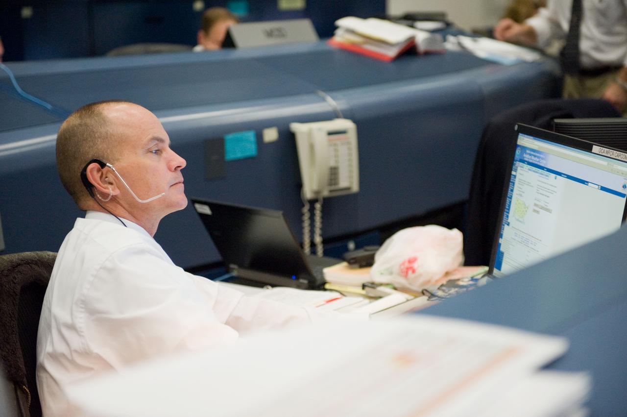 JSC2010-E-018976 (7 Feb. 2010) --- Astronaut Rick Sturckow, STS-130 spacecraft communicator (CAPCOM), is pictured at his console in the space shuttle flight control room in the Johnson Space Center's Mission Control Center during the first launch attempt of the STS-130 mission. The launch was postponed until Feb. 8, due to weather conditions.