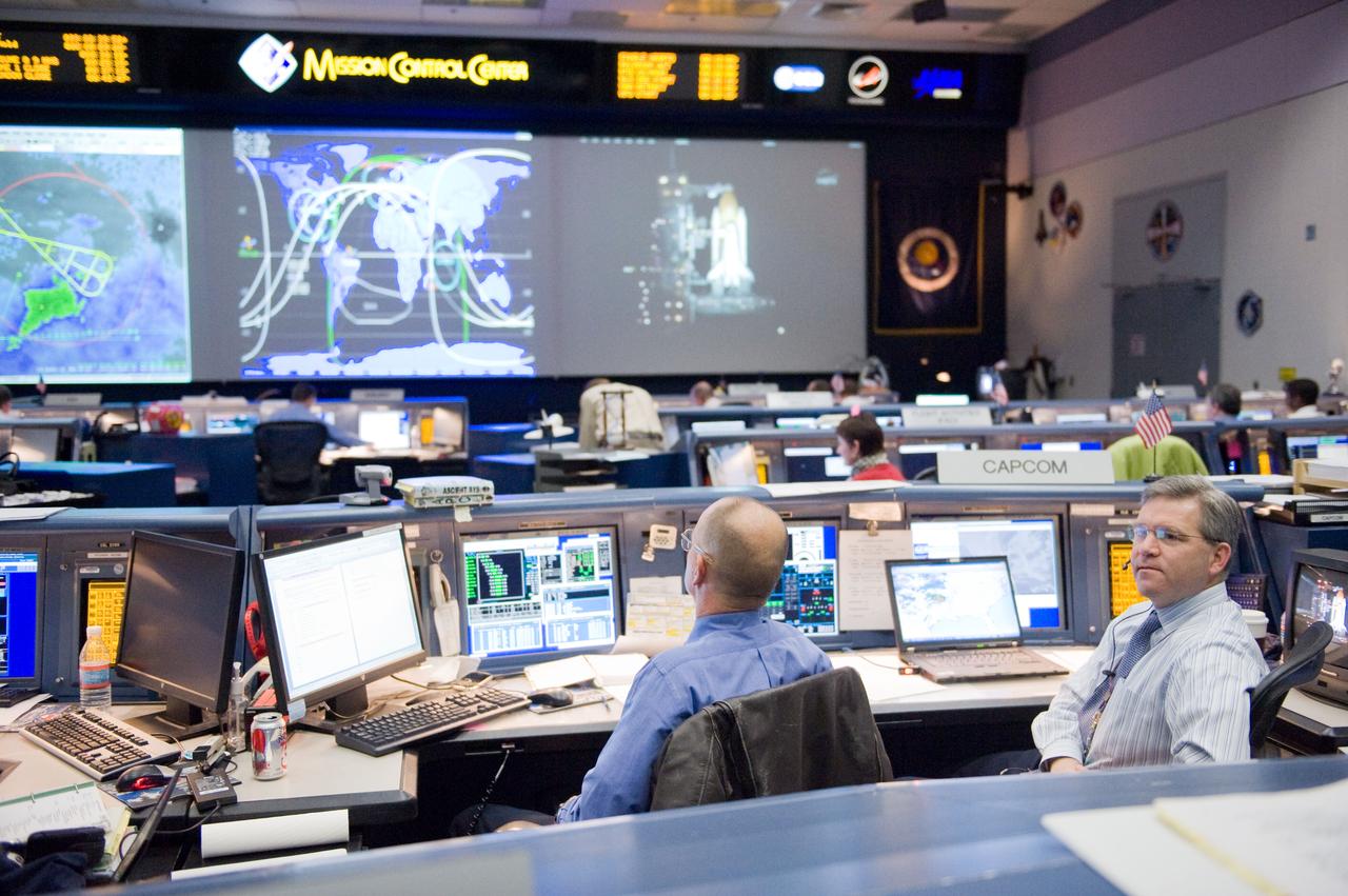 JSC2010-E-019014 (8 Feb. 2010) --- An overall view of the space shuttle flight control room in the Johnson Space Center's Mission Control Center during launch countdown activities a few hundred miles away in Florida, site of space shuttle Endeavour's STS-130 launch. In the foreground are astronauts Rick Sturckow (left) and Steve Frick at the spacecraft communicator (CAPCOM) console.