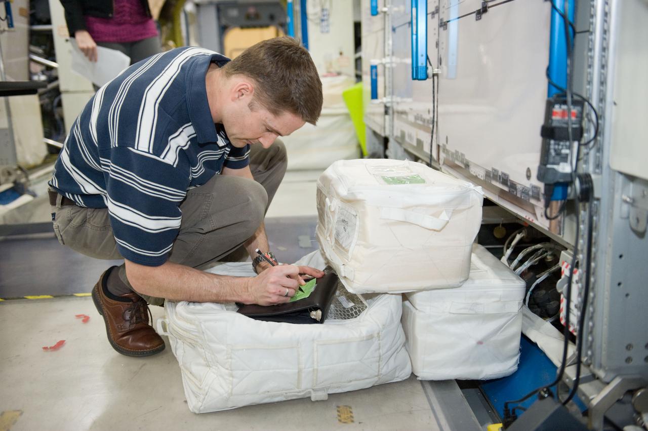 JSC2010-E-019473 (8 Feb. 2010) --- NASA astronaut James P. Dutton Jr., STS-131 pilot, participates in a training session in an International Space Station mock-up/trainer in the Space Vehicle Mock-up Facility at NASA's Johnson Space Center.