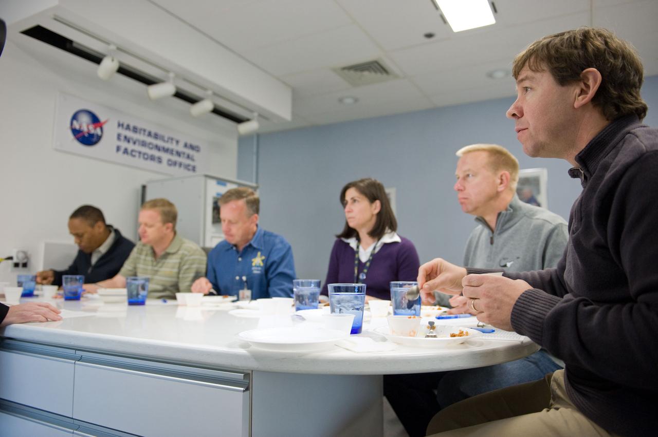 JSC2010-E-020614 (9 Feb. 2010) --- STS-133 crew members participate in a food tasting session in the Habitability and Environmental Factors Office at NASA's Johnson Space Center. Pictured from the left are NASA astronauts Alvin Drew, mission specialist; Eric Boe, pilot; Steve Lindsey, commander; Nicole Stott, Tim Kopra and Michael Barratt, all mission specialists.