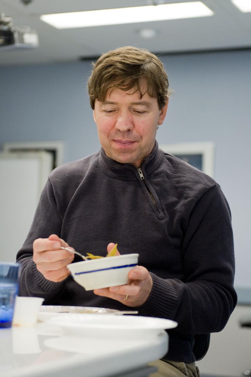 JSC2010-E-020622 (9 Feb. 2010) --- NASA astronaut Michael Barratt, STS-133 mission specialist, participates in a food tasting session in the Habitability and Environmental Factors Office at NASA's Johnson Space Center.