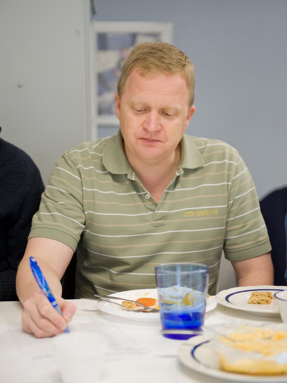 JSC2010-E-020624 (9 Feb. 2010) --- NASA astronaut Eric Boe, STS-133 pilot, participates in a food tasting session in the Habitability and Environmental Factors Office at NASA's Johnson Space Center.
