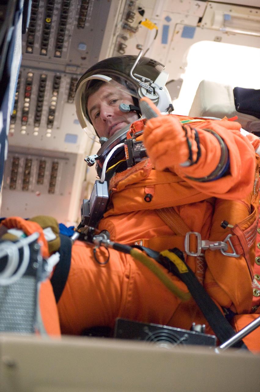 JSC2010-E-024598 (11 Feb. 2010) --- Attired in a training version of his shuttle launch and entry suit, European Space Agency astronaut Roberto Vittori, STS-134 mission specialist, participates in a training session on the flight deck of the crew compartment trainer (CCT-2) in the Space Vehicle Mockup Facility at NASA's Johnson Space Center.