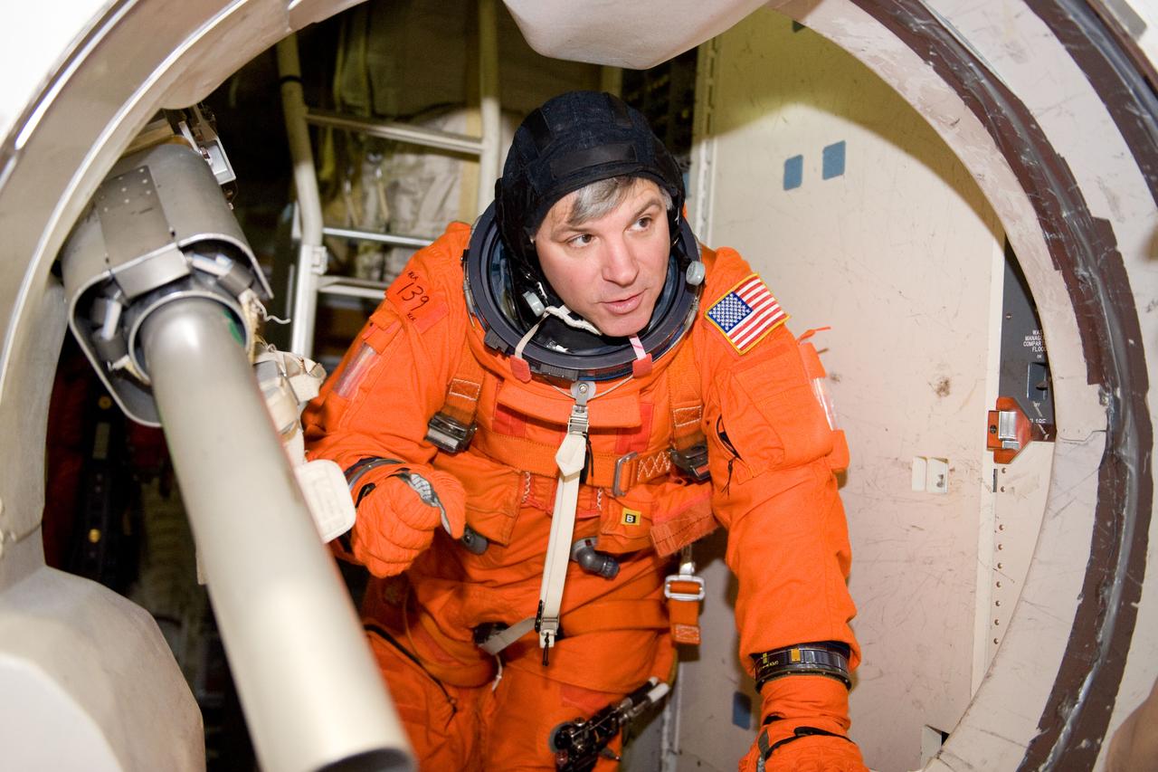 JSC2010-E-024609 (11 Feb. 2010) --- NASA astronaut Gregory H. Johnson, STS-134 pilot, attired in a training version of his shuttle launch and entry suit, participates in a training session in the crew compartment trainer (CCT-2) in the Space Vehicle Mockup Facility at NASA's Johnson Space Center.