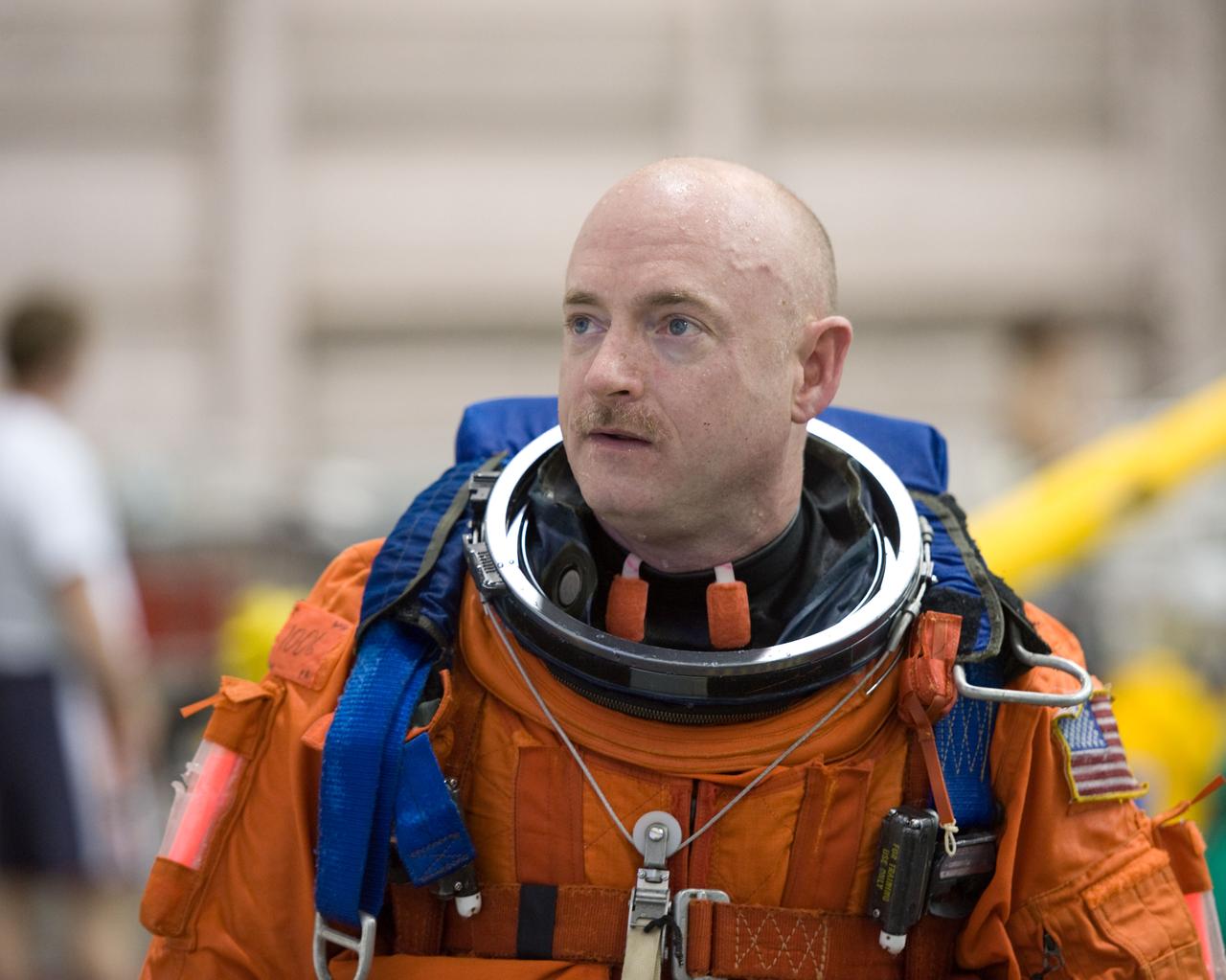 JSC2010-E-025713 (23 Feb. 2010) --- NASA astronaut Mark Kelly, STS-134 commander, attired in a training version of his shuttle launch and entry suit, is pictured during a water survival training session in the Neutral Buoyancy Laboratory (NBL) near NASA's Johnson Space Center.