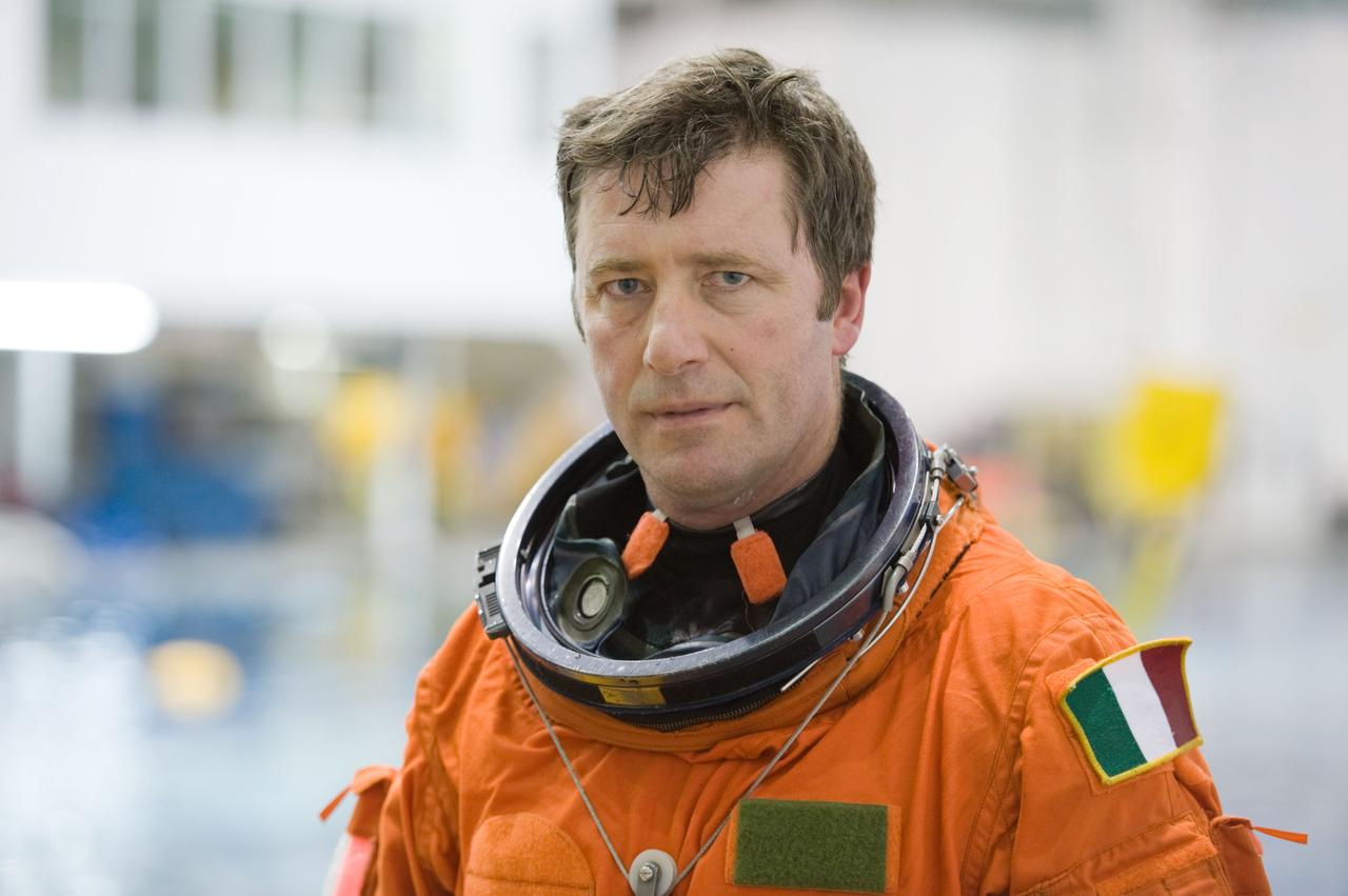 JSC2010-E-025744 (23 Feb. 2010) --- Attired in a training version of his shuttle launch and entry suit, European Space Agency astronaut Roberto Vittori, STS-134 mission specialist, is pictured during a water survival training session in the Neutral Buoyancy Laboratory (NBL) near NASA's Johnson Space Center.