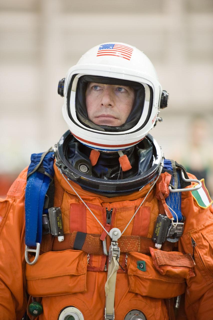 JSC2010-E-025755 (23 Feb. 2010) --- Attired in a training version of his shuttle launch and entry suit, European Space Agency astronaut Roberto Vittori, STS-134 mission specialist, is pictured during a water survival training session in the Neutral Buoyancy Laboratory (NBL) near NASA's Johnson Space Center.