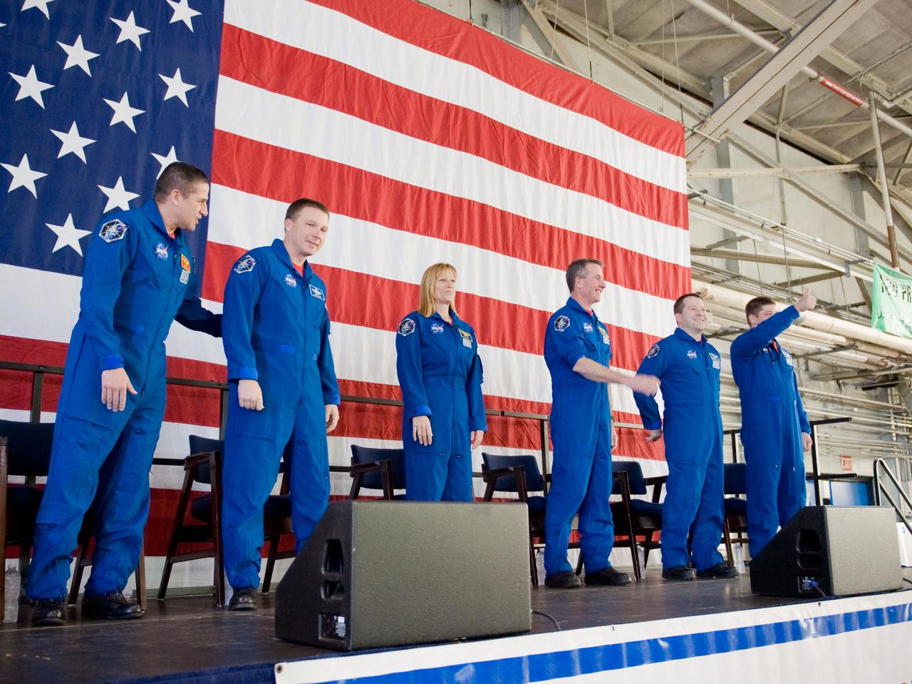 JSC2010-E-025782 (22 Feb. 2010) --- The STS-130 crew members are pictured during the STS-130 crew return ceremony on Feb. 22, 2010 at Ellington Field near NASA?s Johnson Space Center. From the left are NASA astronauts George Zamka, commander; Terry Virts, pilot; Kathryn Hire, Stephen Robinson, Nicholas Patrick and Robert Behnken, all mission specialists.