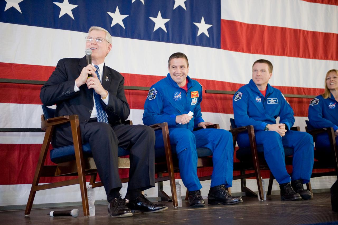 JSC2010-E-025783 (22 Feb. 2010) --- NASA's Johnson Space Center (JSC) director Michael L. Coats addresses a large crowd of well-wishers at the STS-130 crew return ceremony on Feb. 22, 2010 at Ellington Field near JSC. Also pictured (from the second left) are NASA astronauts George Zamka, commander; Terry Virts, pilot; and Kathryn Hire, mission specialist.