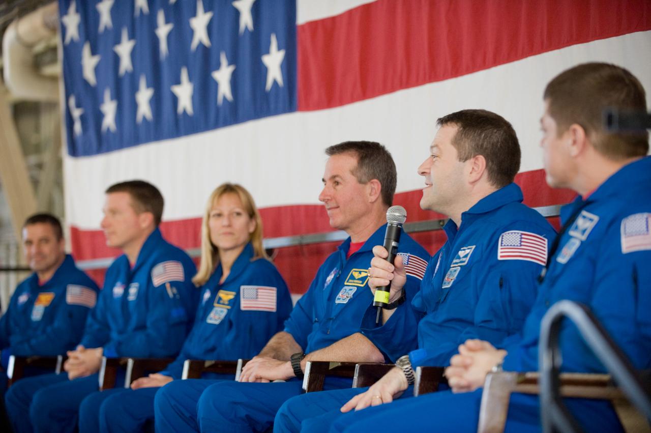 JSC2010-E-025797 (22 Feb. 2010) --- The STS-130 crew members are pictured during the STS-130 crew return ceremony on Feb. 22, 2010 at Ellington Field near NASA?s Johnson Space Center. From the left are NASA astronauts George Zamka, commander; Terry Virts, pilot; Kathryn Hire, Stephen Robinson, Nicholas Patrick and Robert Behnken, all mission specialists.