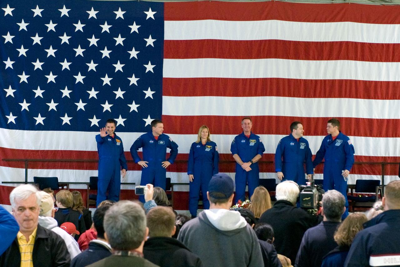 JSC2010-E-025815 (22 Feb. 2010) --- The STS-130 crew members are pictured during the STS-130 crew return ceremony on Feb. 22, 2010 at Ellington Field near NASA?s Johnson Space Center. From the left are NASA astronauts George Zamka, commander; Terry Virts, pilot; Kathryn Hire, Stephen Robinson, Nicholas Patrick and Robert Behnken, all mission specialists.