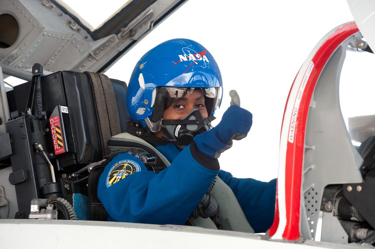 JSC2010-E-032825 (1 March 2010) --- NASA astronaut Stephanie Wilson, STS-131 mission specialist, gives a ?thumbs-up? signal as she prepares for a flight in a NASA T-38 trainer jet from Ellington Field near NASA's Johnson Space Center to Kennedy Space Center, Florida.