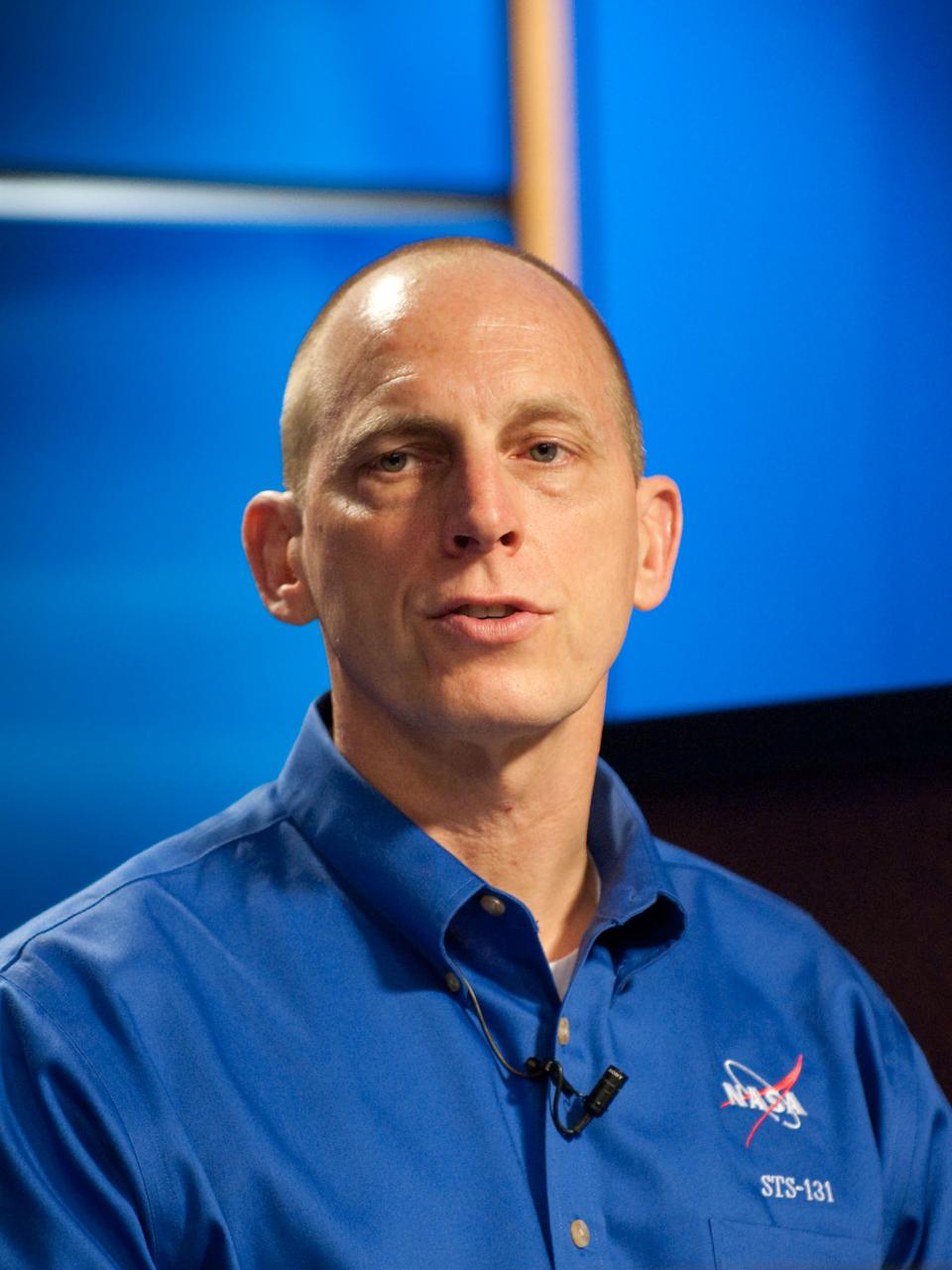 JSC2010-E-038799 (9 March 2010) --- NASA astronaut Clayton Anderson, STS-131 mission specialist, responds to a question from a reporter during an STS-131 preflight press conference at NASA's Johnson Space Center.