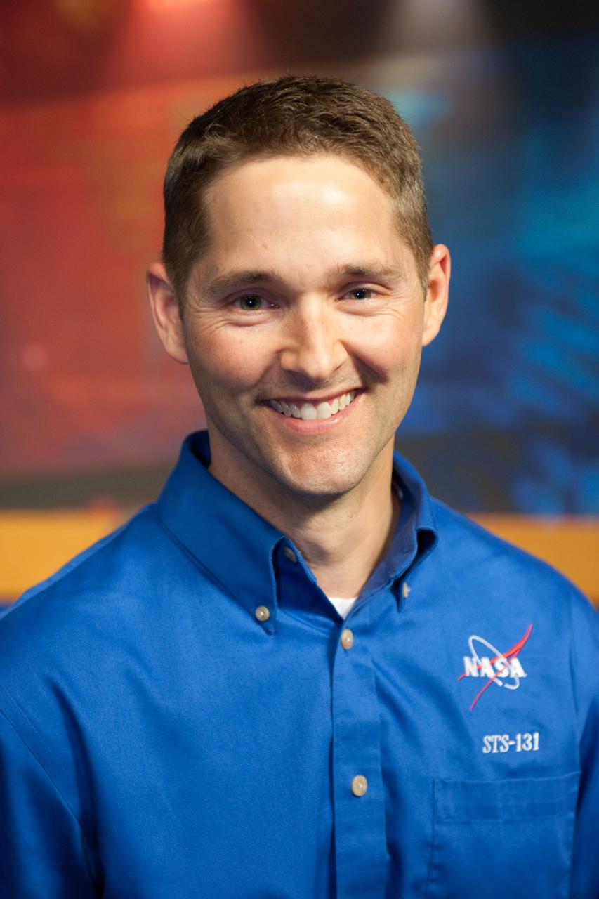 JSC2010-E-038823 (9 March 2010) --- NASA astronaut James Dutton poses for photos during the press day event for the scheduled April mission. NASA astronauts  Alan Poindexter and Dutton will serve as the mission commander and pilot, respectively. They will be joined by astronauts Clayton Anderson, Rick Mastracchio, Dorothy Metcalf-Lindenburger and Stephanie Wilson, along with Naoko Yamazaki of the Japan Aerospace Exploration Agency, all mission specialists.