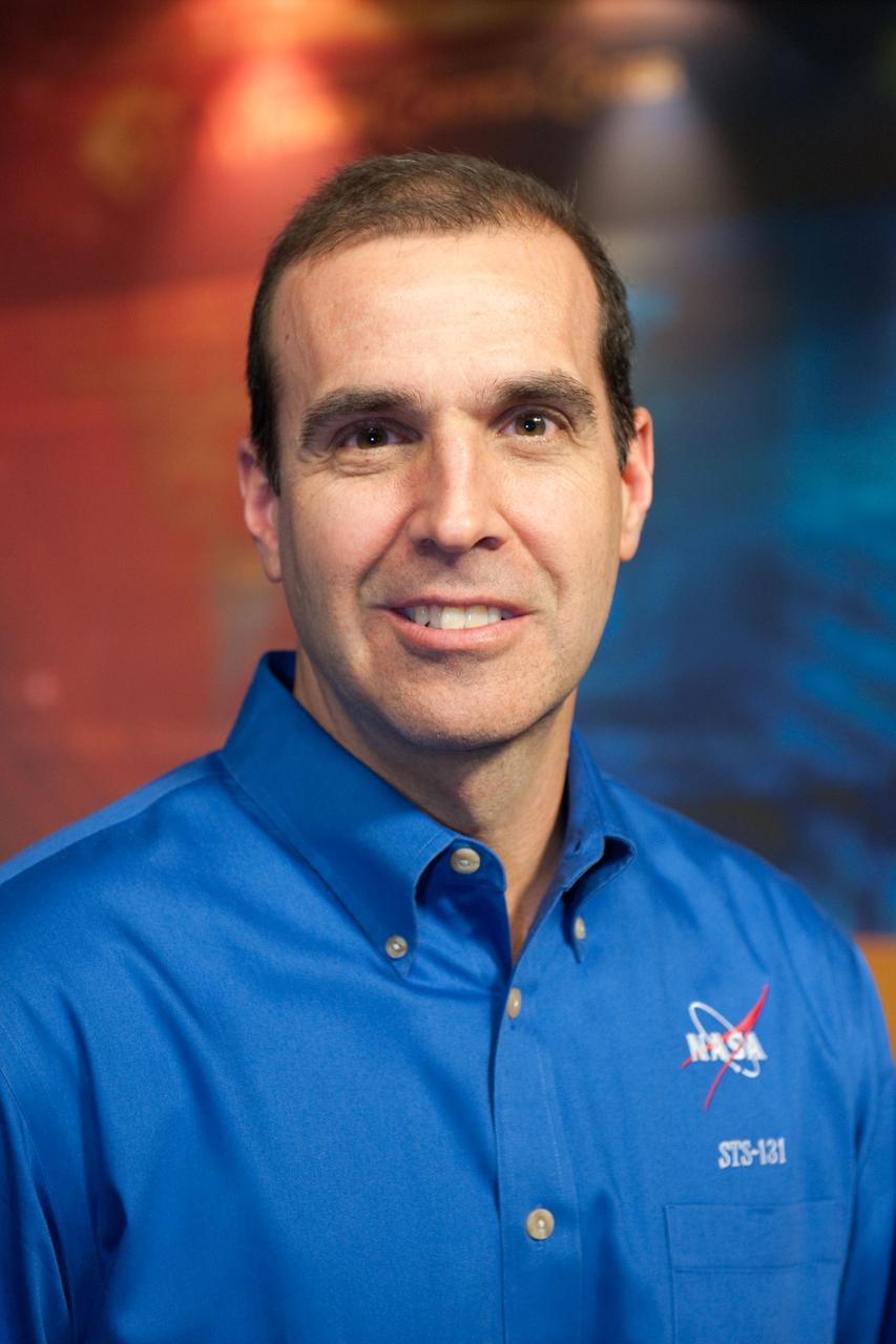 JSC2010-E-038824 (9 March 2010) --- NASA astronaut Rick Mastracchio, STS-131 mission specialist, poses for photos during the press day event for the scheduled April mission. NASA astronauts Alan Poindexter and James Dutton will serve as the mission commander and pilot, respectively. They will be joined by astronauts Clayton Anderson, Mastracchio, Dorothy Metcalf-Lindenburger and Stephanie Wilson, along with Naoko Yamazaki of the Japan Aerospace Exploration Agency, all mission specialists.