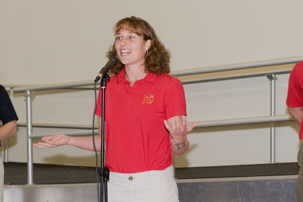 JSC2010-E-039290 (10 March 2010) --- NASA astronaut Dorothy Metcalf-Lindenburger, STS-131 mission specialist, speaks to a crowd during a cake-cutting ceremony in the Jake Garn Simulation and Training Facility at NASA's Johnson Space Center.