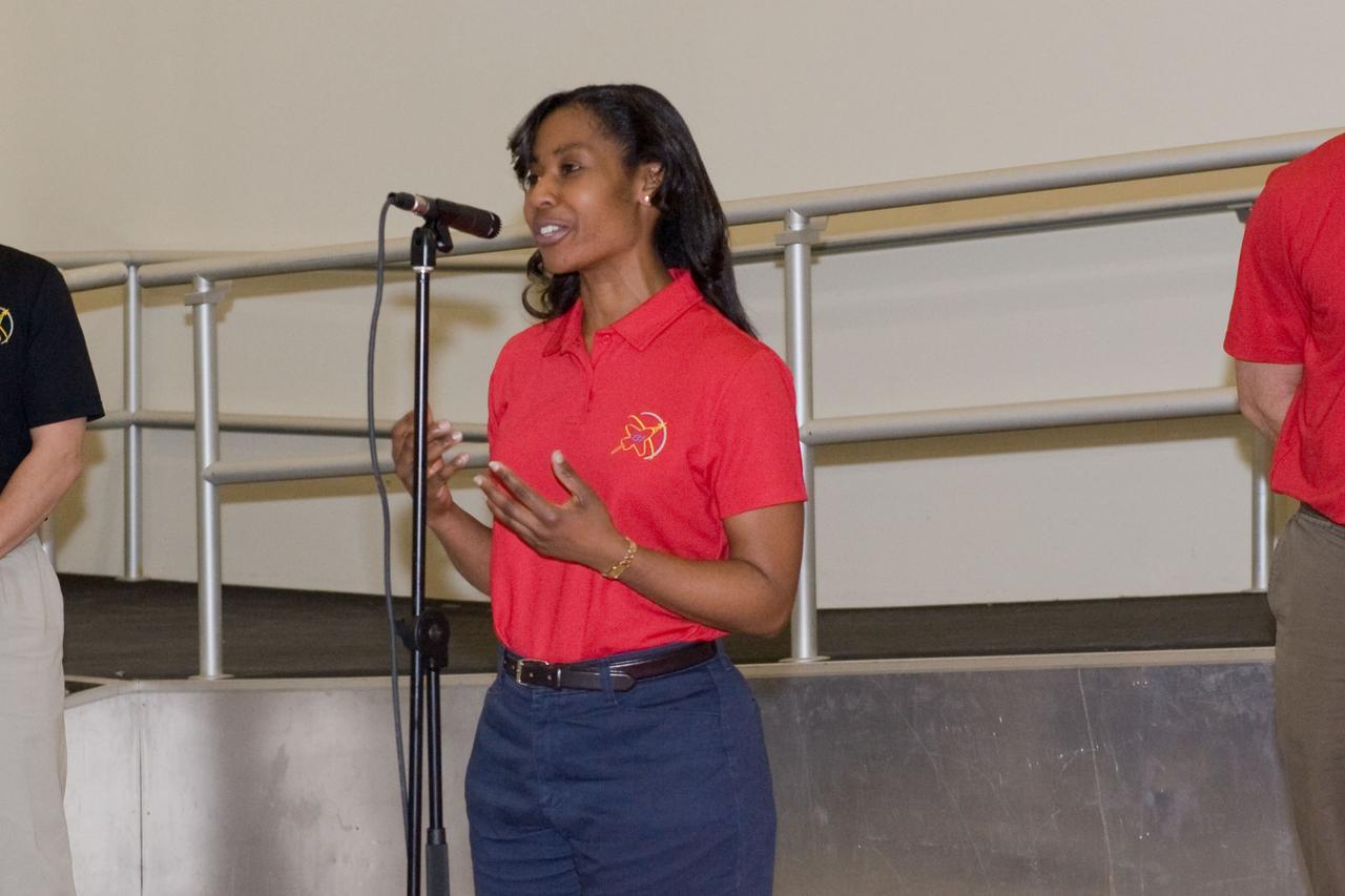JSC2010-E-039291 (10 March 2010) --- NASA astronaut Stephanie Wilson, STS-131 mission specialist, speaks to a crowd during a cake-cutting ceremony in the Jake Garn Simulation and Training Facility at NASA's Johnson Space Center.